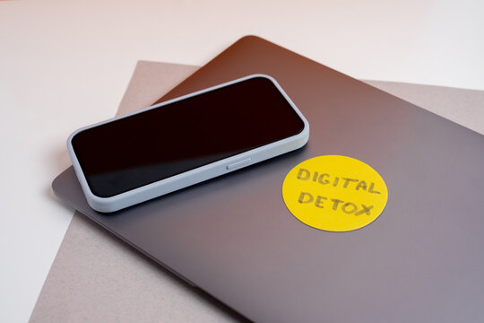 Technology concept - words of digital detox digital gadgets. Concept of social media addiction. Stop using digital gadgets at home and outside of work hours.