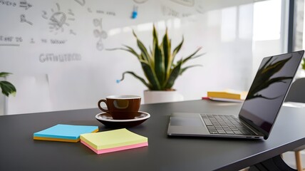 Modern Workspace with Laptop, Sticky Notes, and Greenery
