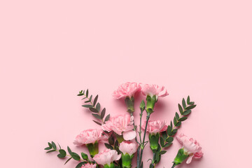 Naklejka premium Beautiful carnation flowers with eucalyptus branches on pink background. Mother's Day celebration