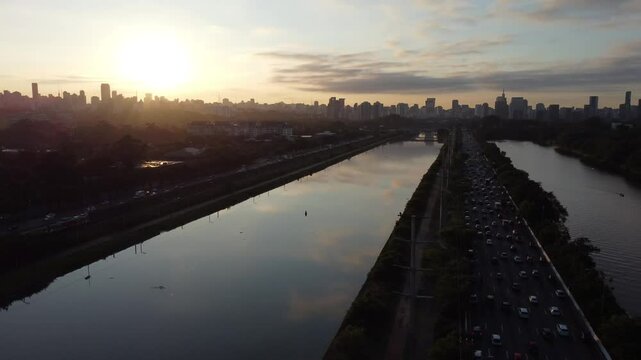 Amazing megalopolis S&atilde;o Paulo Latin America with sunrise on the Pinheiros River along the marginal highway