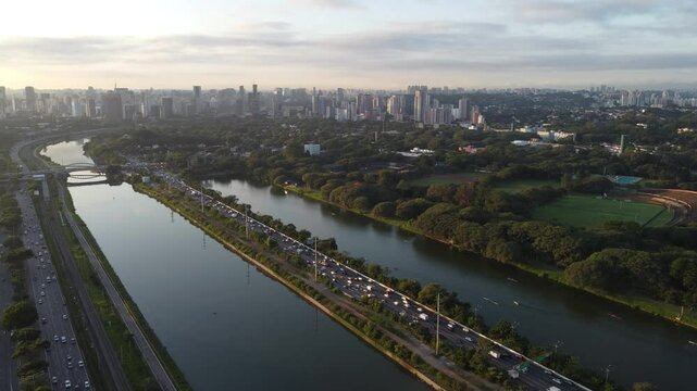 Amazing megalopolis S&atilde;o Paulo Latin America with sunrise on the Pinheiros River along the marginal highway