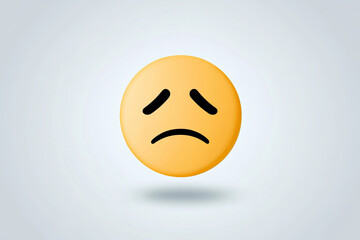 A melancholic yellow emoticon conveying feelings of sadness and disappointment, with a soft shadow against a simple light gray background.