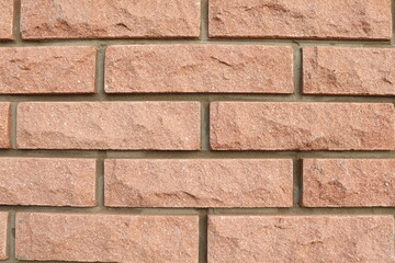 Brick wall background. Red brick texture. Rustic brick wall backdrop. Old brick surface. Vintage brick pattern.