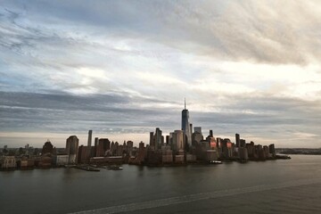 Obraz premium New York city Manhattan skyline from New Jersey. Manhattan over the Hudson river. NYC cityscape, aerial view. Manhattan downtown skyline with urban skyscrapers. New York Manhattan from above.