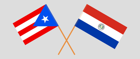 Crossed flags of Puerto Rico and Republic of Paraguay. Official colors. Correct proportion. Vector illustration