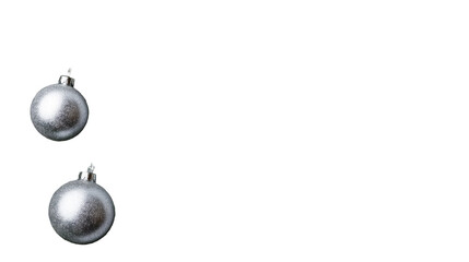 Silver sparkling baubles on black background, cut out transparent