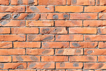 Obraz premium red brick wall at square format as background and texture