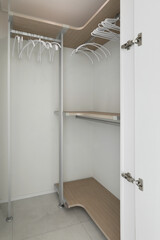 Install a system hanger in a small dressing room