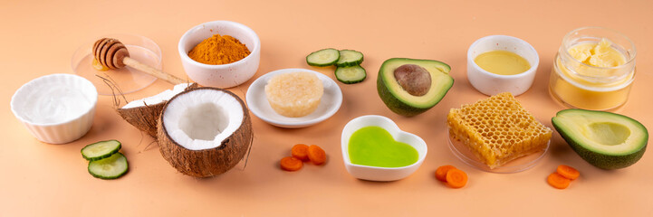 DIY Natural Sunscreen Alternative, Anti-Sunscreen Movement. Natural organic SPF ingredients background with olive oil, coconut oil, cocoa butter, aloe gel, beeswax, carrot seed oil