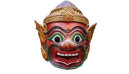 Fototapeta premium a traditional Thai mask, intricately carved and painted, showcasing vibrant colors and intricate details. This cultural artifact is a striking representation of Thai artistry and tradition.
