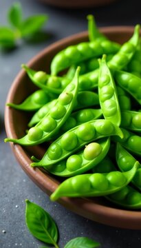 Close-up of crisp green peapods on clean table, vegetarian, healthy, diet