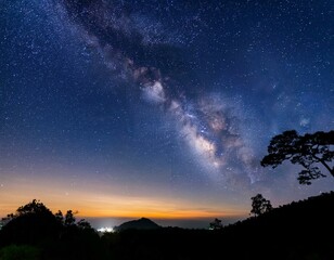 Fototapeta premium Milky Way with stars shining brightly beautiful at night on the sky background in Thailand 