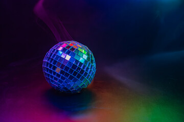 Vibrant disco image with colorful smoke, ideal for promotional materials about music, parties or events with a retro or festive theme