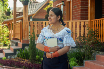 Cultural Woman in Vibrant Traditional Attire Gracefully Posing Outdoors Among Nature