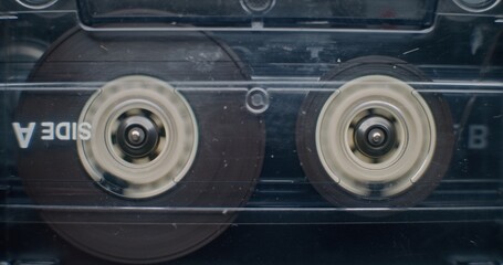 Vintage Audio Cassette Tape Playing Music or Analog Sound, Spools Spinning. Playback of Mixtapes...
