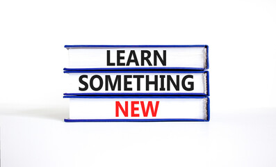 Learn something new symbol. Concept words Learn something new on beautiful books. Beautiful white paper background. Business motivational lifestyle learn something new concept. Copy space.