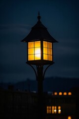 a close up of a street light with a building in the background
