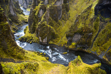 Unique landscape of Fjadrargljufur in Iceland. Top tourism destination. Fjadrargljufur Canyon is a massive canyon about 100 meters deep, located in South East of Iceland.
