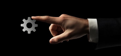 Hand points to gear icon