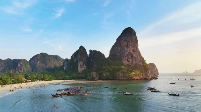 Railay beach with long tail boat in Krabi, Thailand.