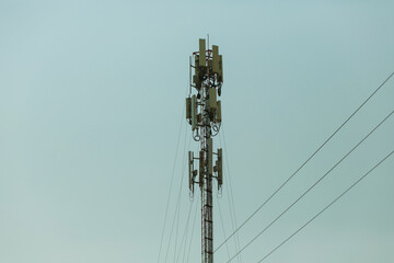 Mobile phone signal tower with sky background