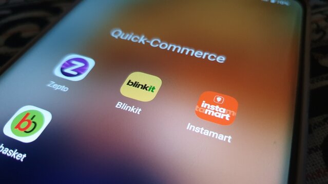 New Delhi, India - March 31 2025: Quick commerce apps icon on smartphone screen. 10 min grocery items delivery in Indian cities. Zepto, Blinkit, Swiggy Instamart, Bigbasket etc.