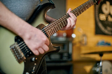 Guitarist Playing Electric Bass Guitar Close Up