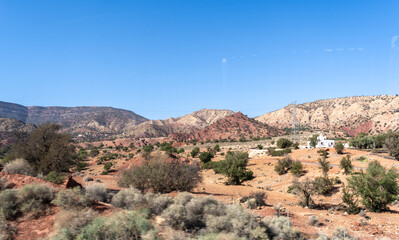 Morocco semi-deserts and mountains, north africa nature, Moroccan stone desert, red hills, villages and argan trees