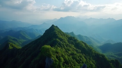 Naklejka premium Aerial View of Lush Green Mountains Under a Clear Sky