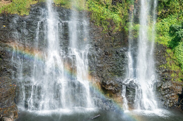 A spectacular Tad Gneuang Waterfall amid a lush forest, Bolawen Plateau, Laos