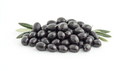 Dark chocolate-covered olives, a pile of dark chocolate-covered olives with fresh green leaves