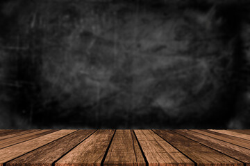 Wooden table background of free space for your decoration. Black shadow and wall of free space for your text. 