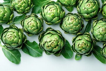 Fototapeta premium Fresh artichokes arranged with vibrant green leaves, showcasing