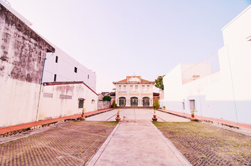 Beautiful Colonial House Amidst Urban Setting with Courtyard..