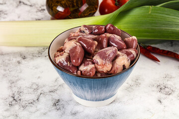 Raw chicken hearts in the bowl