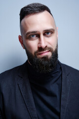 Obraz premium Studio portrait of young handsome man with beard.