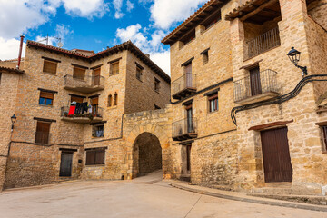 Stone houses with wooden windows and doors in the area of Matarrana, Cretas, Teruel.
