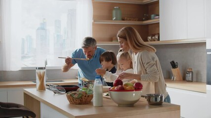 A heartwarming video of a family bonding while cooking together