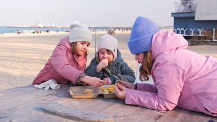Caucasian Kids Eating Fried Fish and Chips French Fries Fast Food Snack in Styrofoam Box Sold at...