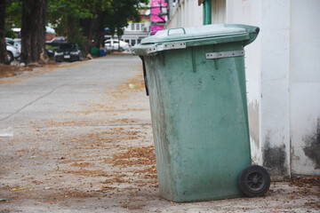 Obraz premium Green plastic trash cans in public places