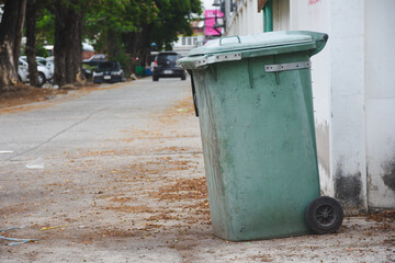 Green plastic trash cans in public places