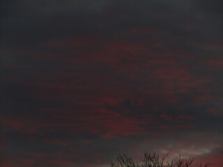 red sky with clouds