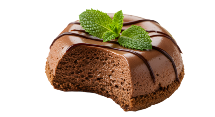 A decadent chocolate mousse dessert with a bite taken out and mint garnish on a black background