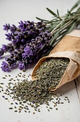 Lavender flowers and seeds spilling from a burlap sack on a wooden surface, emphasizing natural textures and aromas
