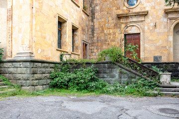 Gagra, Abkhazia-October 11 2024 : Old historical building with columns among the mountains in the Republic of Abkhazia. Building of the Winter Theater in Gagra. Sunny autumn day