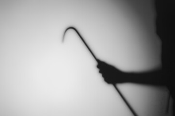 Silhouette of someone holding crowbar,blur image