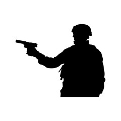 Silhouette of a business man holding a gun in a military pose