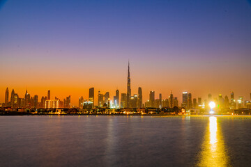 Naklejka premium Beautiful of Dubai Skyline view from the Dubai Creek. Panoramic view of Dubai city skyline. Cityscape in Dubai. UAE.