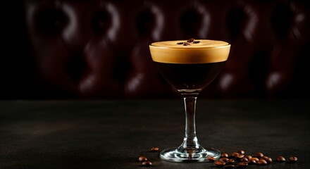 Luxurious espresso martini with coffee beans on dark background