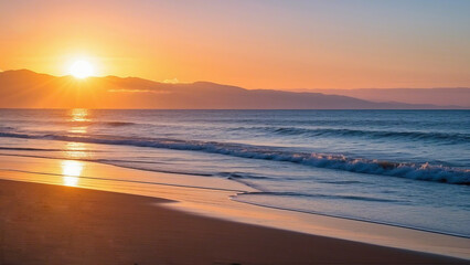 Beautiful sunset over the beach and sea with waves, clouds, and a colorful sky reflecting on the water